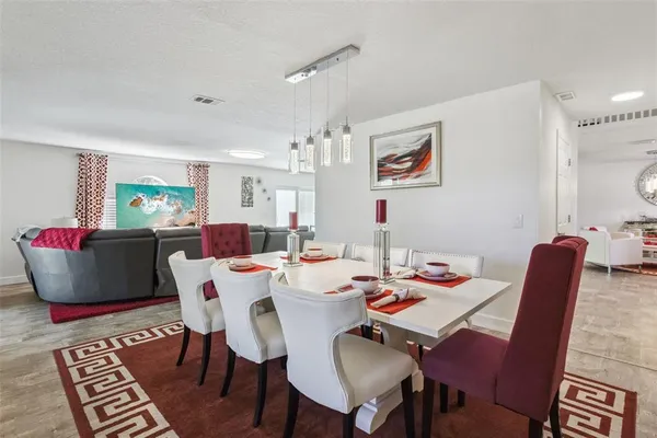 a view of a dining room with furniture