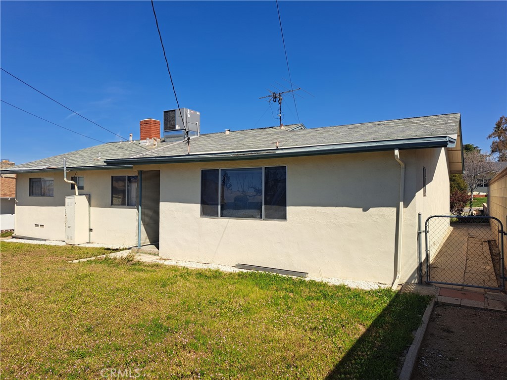 35387 Cornell Drive Yucaipa, CA 92399 - Photo 2 of 2 a front view of a house with a yard