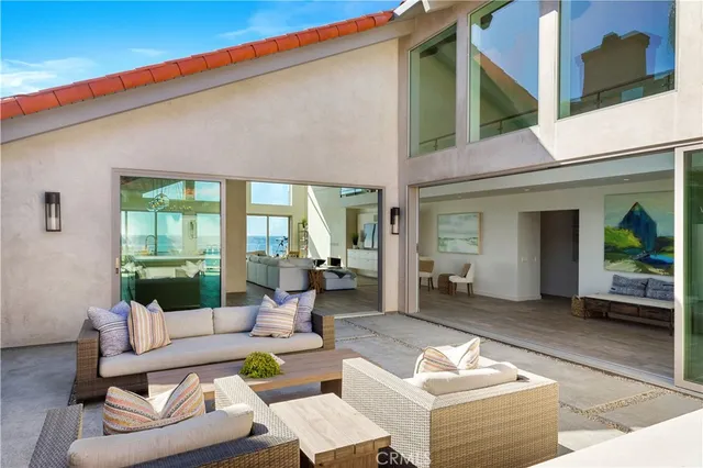 a outdoor living space with furniture and a potted plant