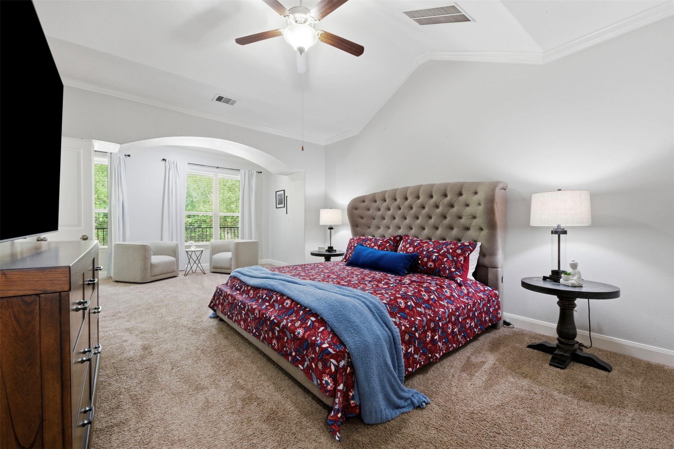 706 Water Street Webster, TX 77598 - Photo 12 of 23 Spacious and serene, the primary suite offers a true retreat at the end of the day.