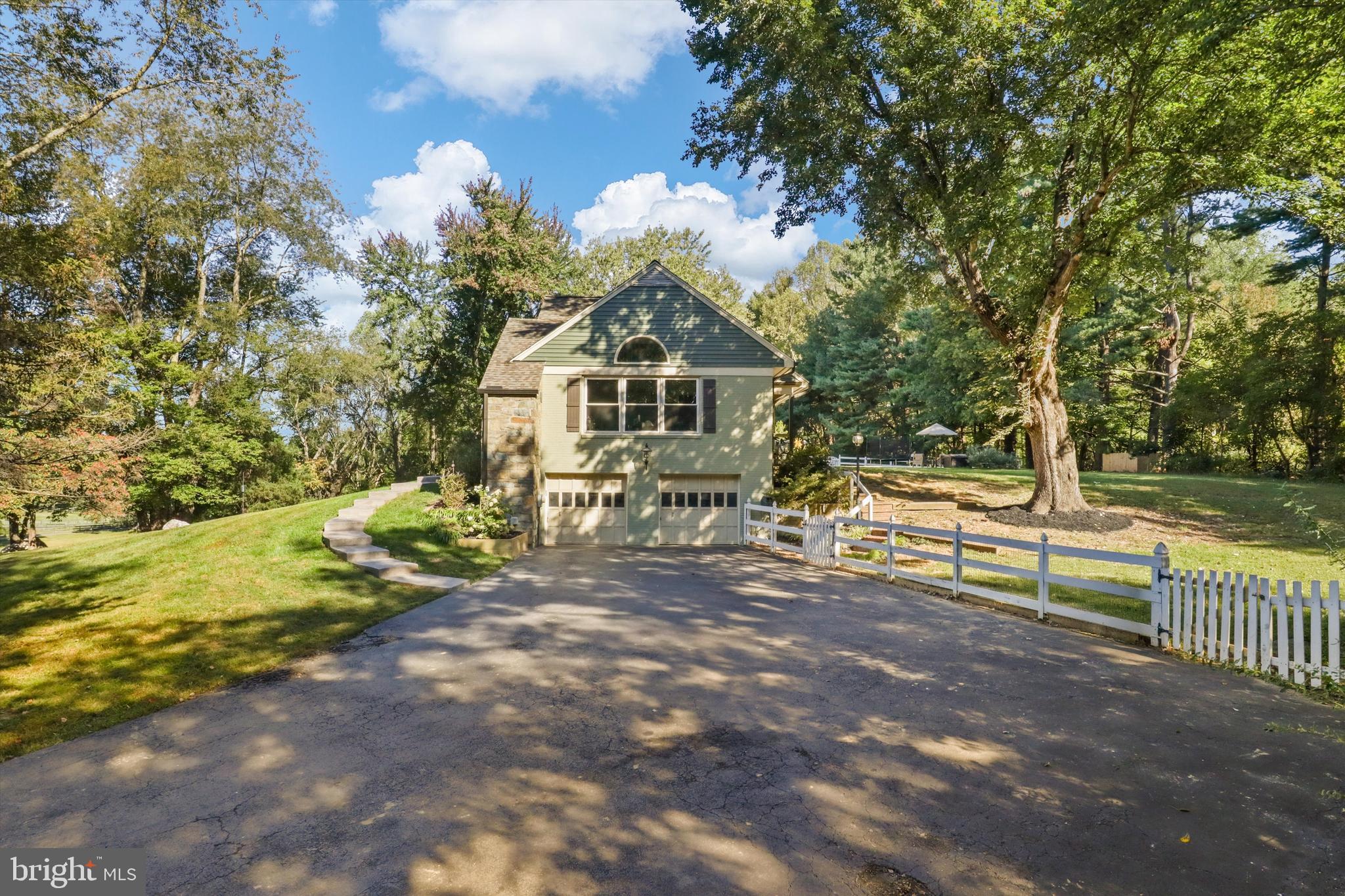 6811 White Rock Road Clifton, VA 20124 - Photo 13 of 87 a front view of a house with a yard