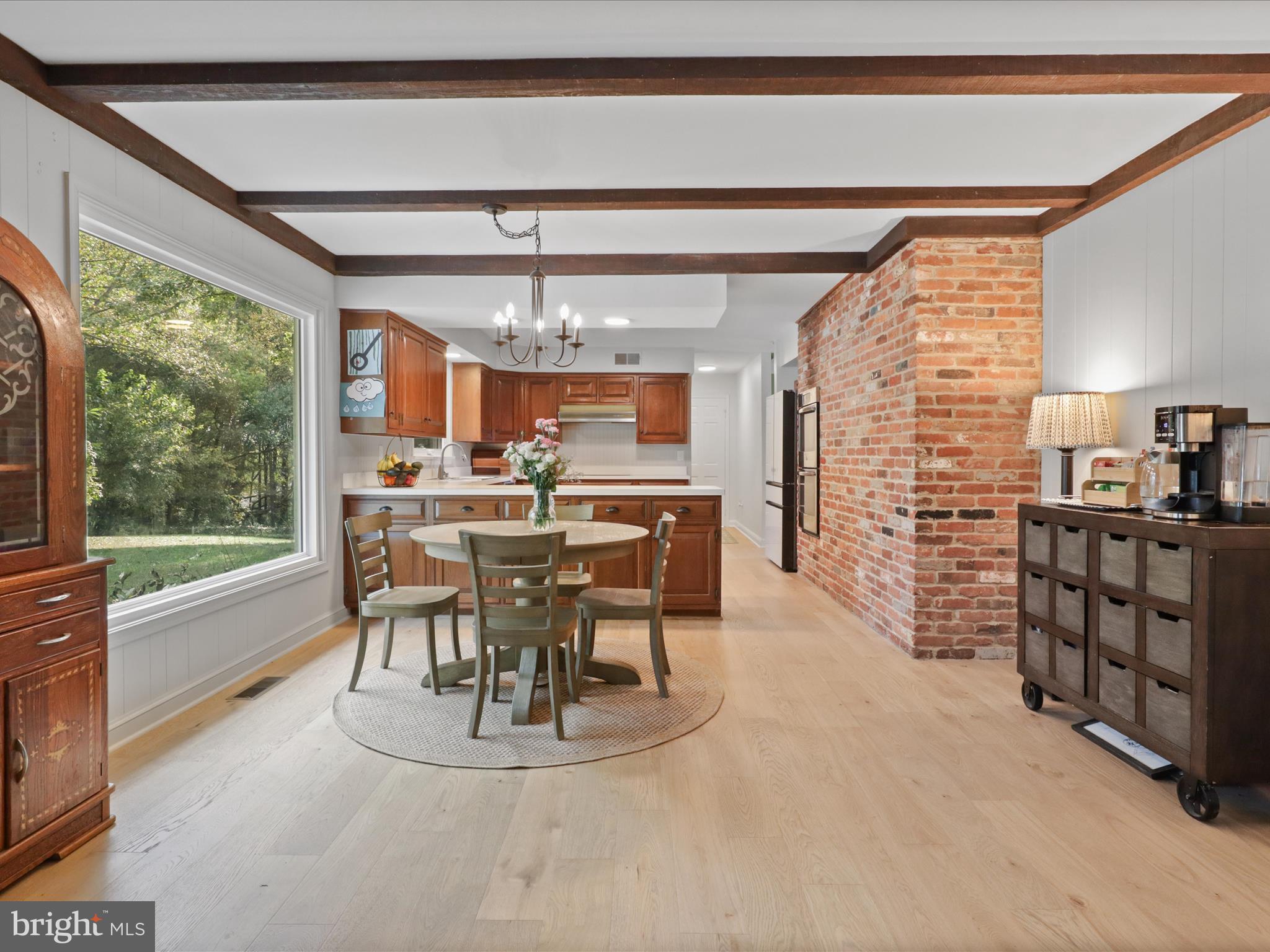 6811 White Rock Road Clifton, VA 20124 - Photo 22 of 87 a view of a dining room with furniture window and outside view