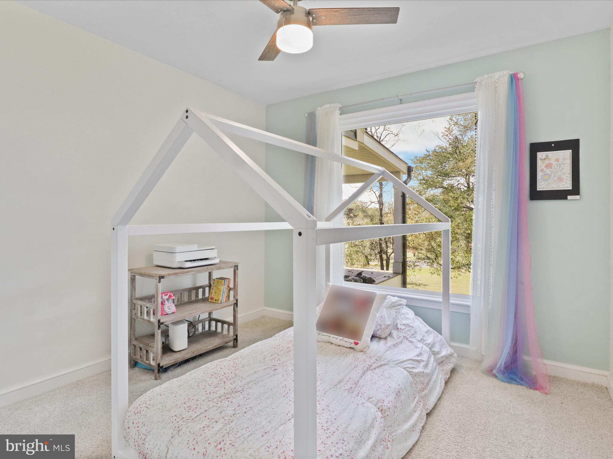 6811 White Rock Road Clifton, VA 20124 - Photo 44 of 87 a bedroom with furniture and a large window