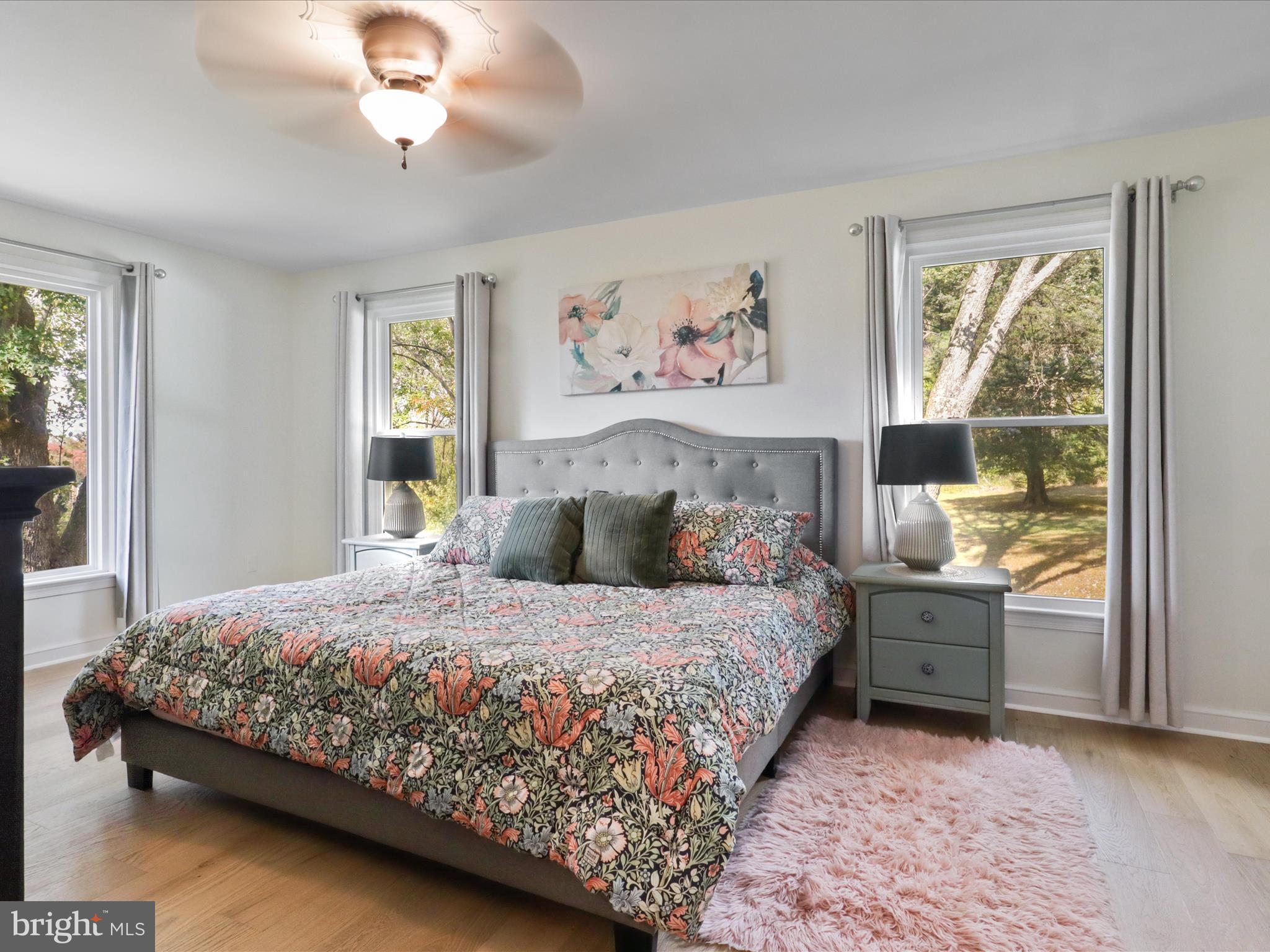 6811 White Rock Road Clifton, VA 20124 - Photo 45 of 87 a bedroom with a large bed and a window