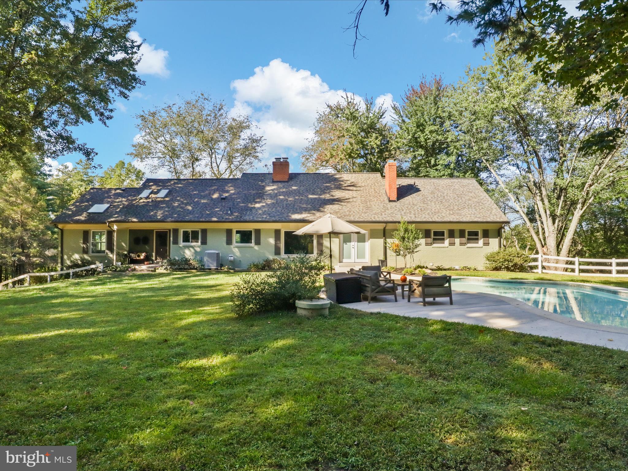 6811 White Rock Road Clifton, VA 20124 - Photo 73 of 87 a view of a house with a yard porch and sitting area