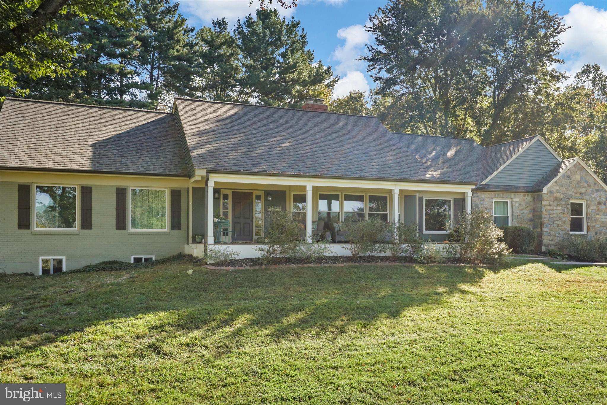 6811 White Rock Road Clifton, VA 20124 - Photo 9 of 87 a front view of a house with a yard