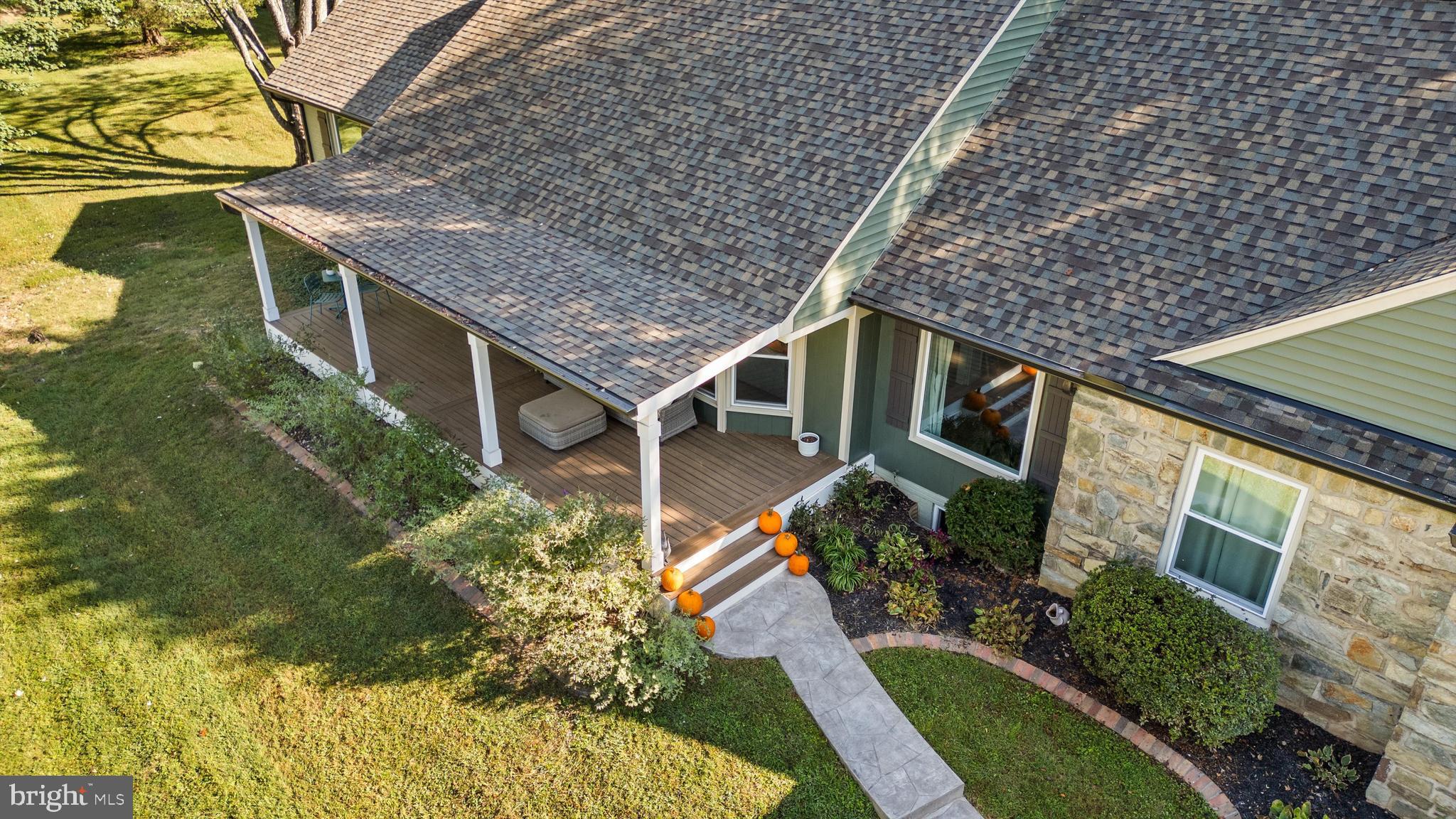 6811 White Rock Road Clifton, VA 20124 - Photo 10 of 87 an aerial view of a house with a yard