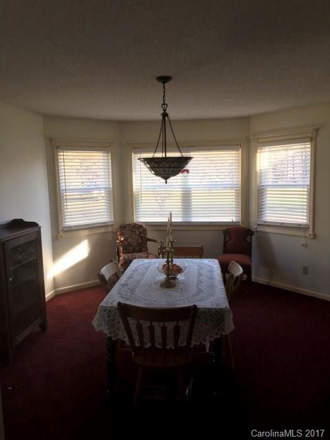 30 Cole Lane Rutherfordton, NC 28139 - Photo 11 of 24 a view of a dining room with furniture window and wooden floor