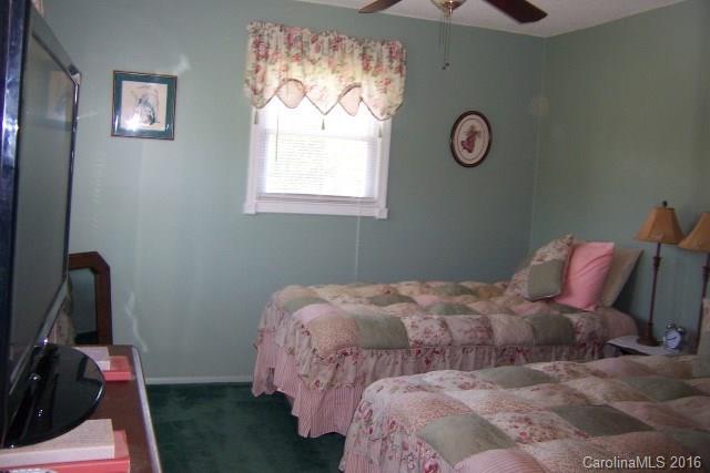 30 Cole Lane Rutherfordton, NC 28139 - Photo 17 of 24 a bedroom with a bed and a window