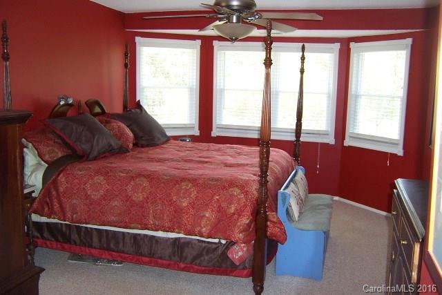 30 Cole Lane Rutherfordton, NC 28139 - Photo 18 of 24 a bed sitting in a bedroom next to a window