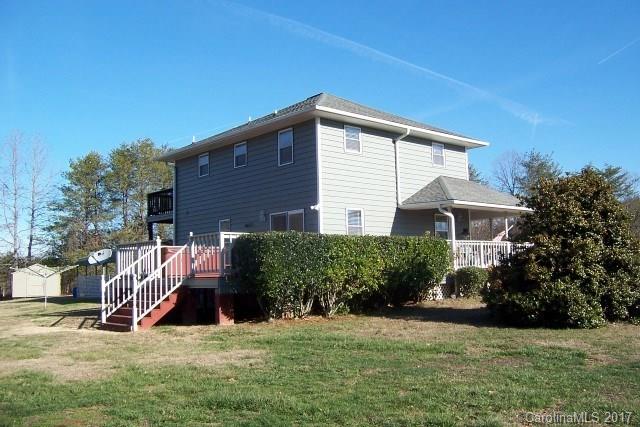 30 Cole Lane Rutherfordton, NC 28139 - Photo 4 of 24 a view of a house with a yard and plants
