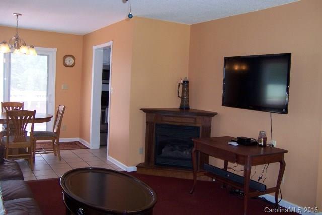 30 Cole Lane Rutherfordton, NC 28139 - Photo 8 of 24 a living room with furniture and a fireplace