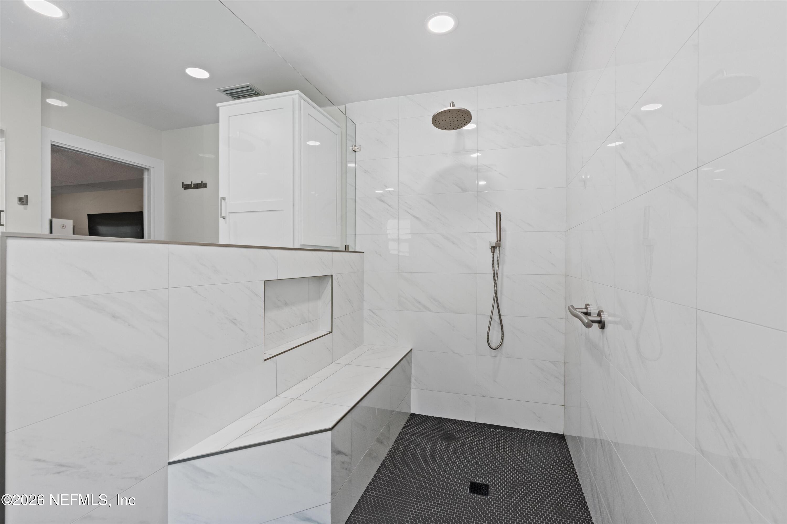 5566 Don Manuel Road Elkton, FL 32033 - Photo 22 of 47 a bathroom with a shower and closet