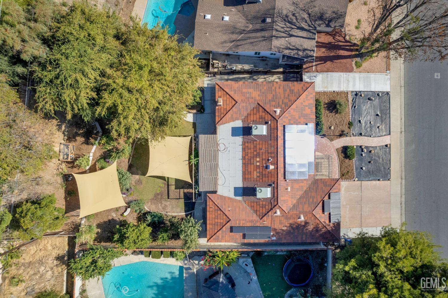 Undisclosed Address Bakersfield, CA 93306 - Photo 37 of 40 an aerial view of a house with a yard and sitting area