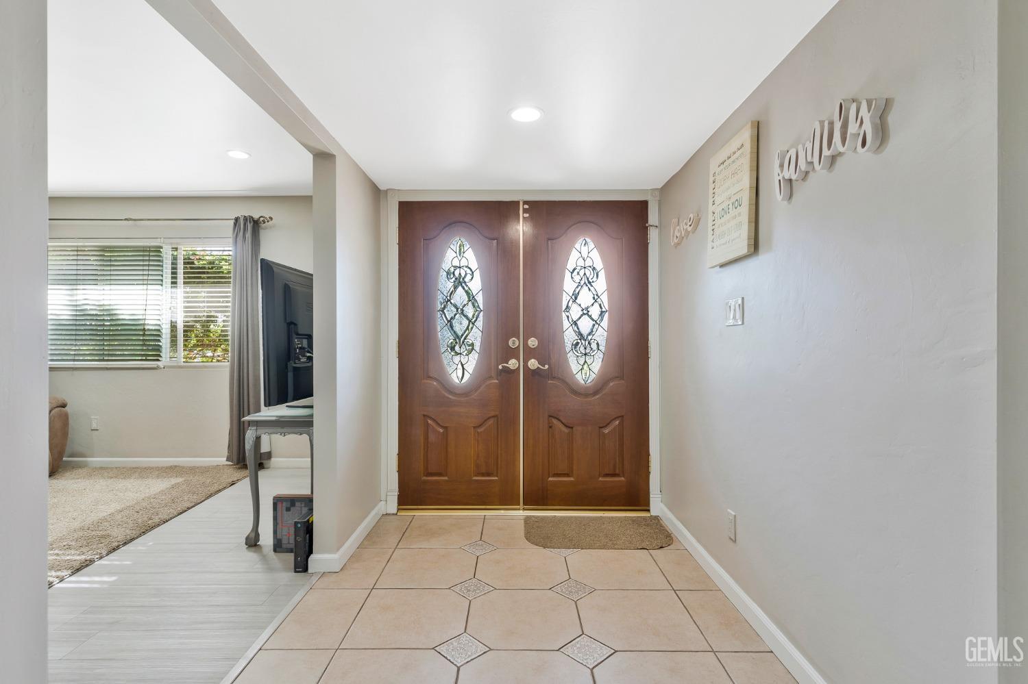 Undisclosed Address Bakersfield, CA 93306 - Photo 5 of 40 an entryway with a door