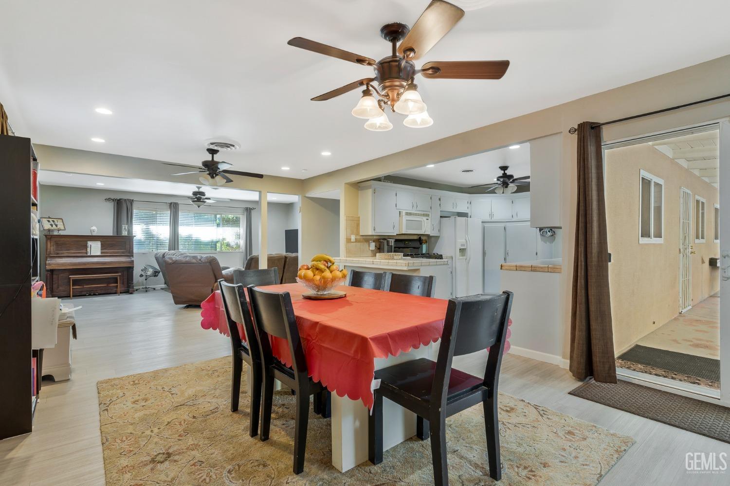 Undisclosed Address Bakersfield, CA 93306 - Photo 8 of 40 a view of a dining room with furniture