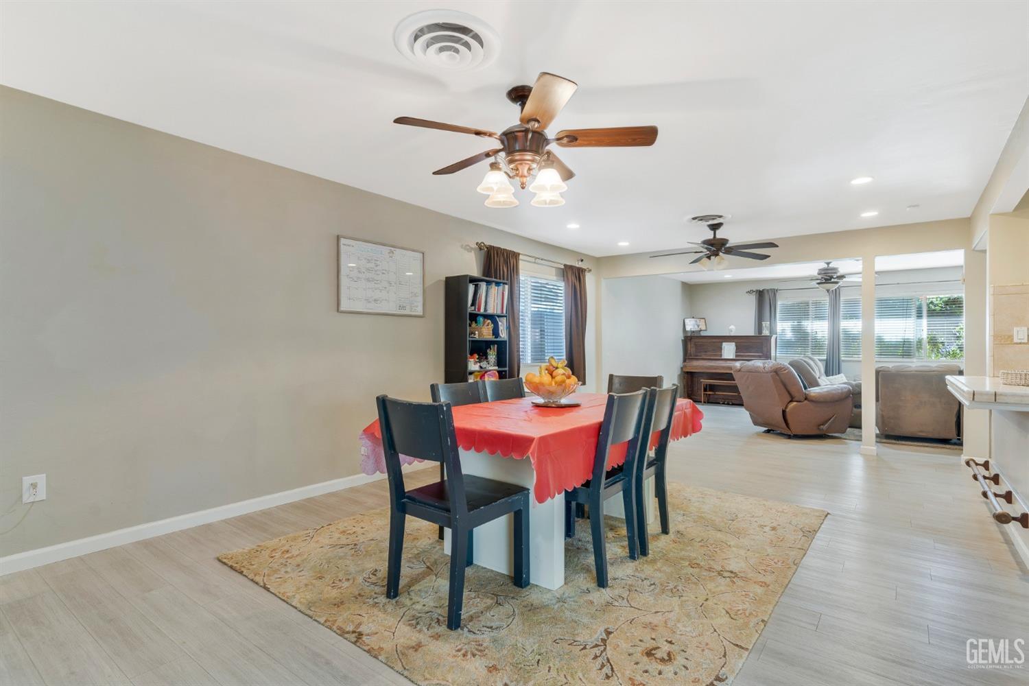 Undisclosed Address Bakersfield, CA 93306 - Photo 9 of 40 a view of a dining room with furniture