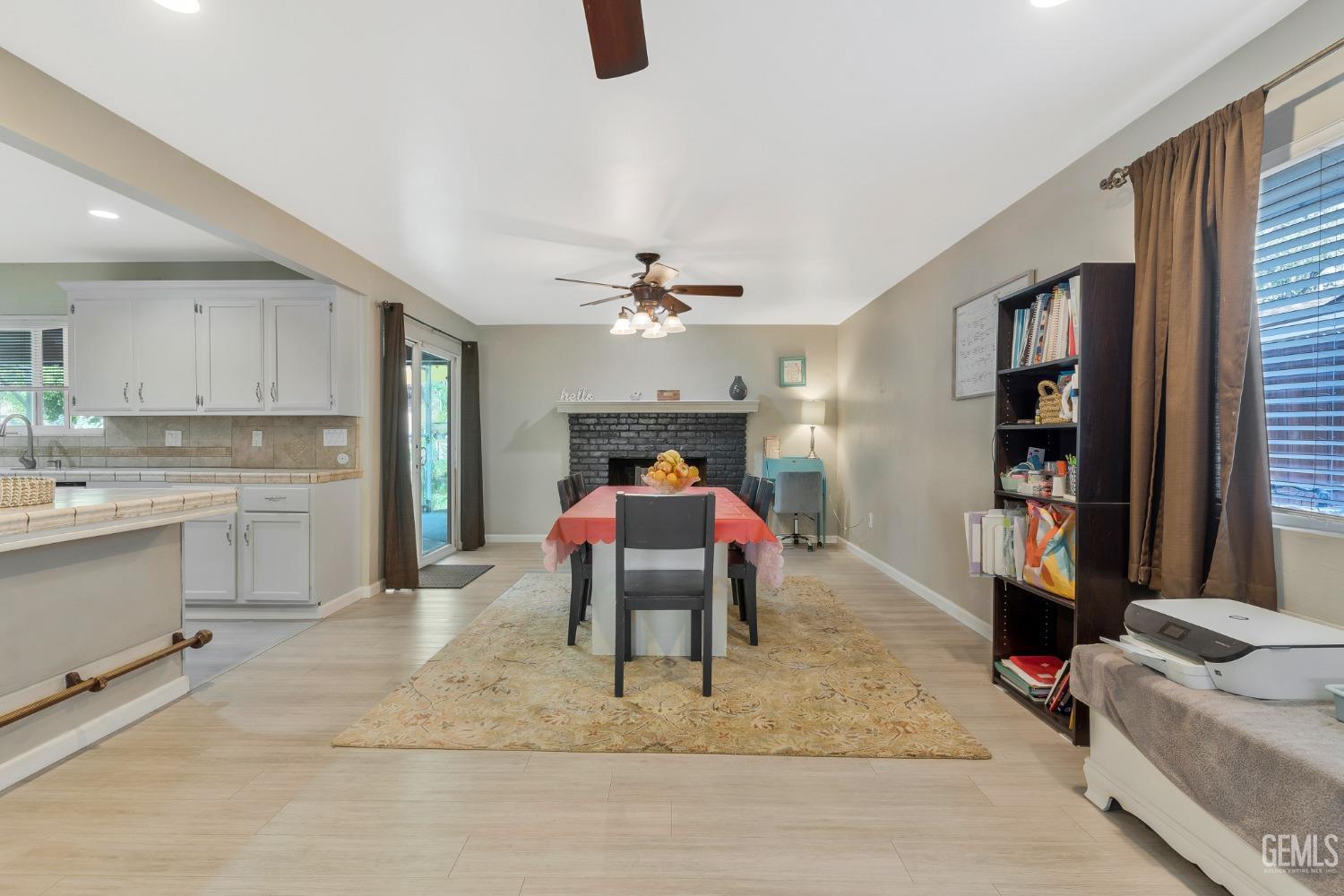 Undisclosed Address Bakersfield, CA 93306 - Photo 10 of 40 a bedroom with furniture and a chandelier