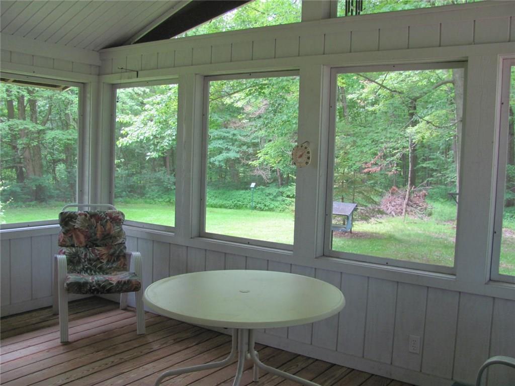 4989 Seneca Road Sharpsville, PA 16150 - Photo 16 of 19 Sunporch to backyard