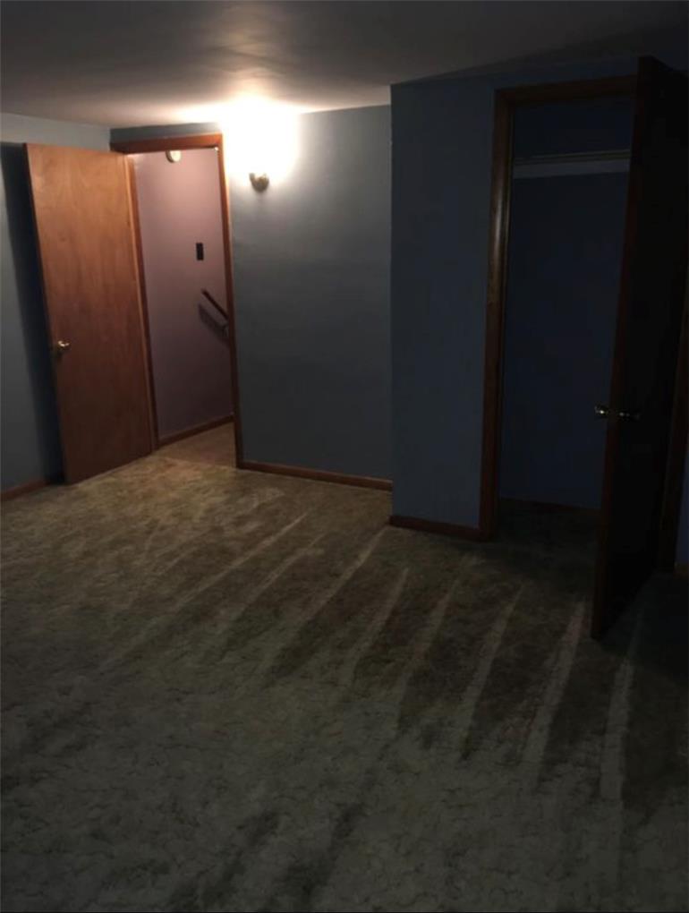 69 West Ridge Street Nesquehoning, PA 18240 - Photo 6 of 8 An inviting room features plush carpeting and convenient closet access.