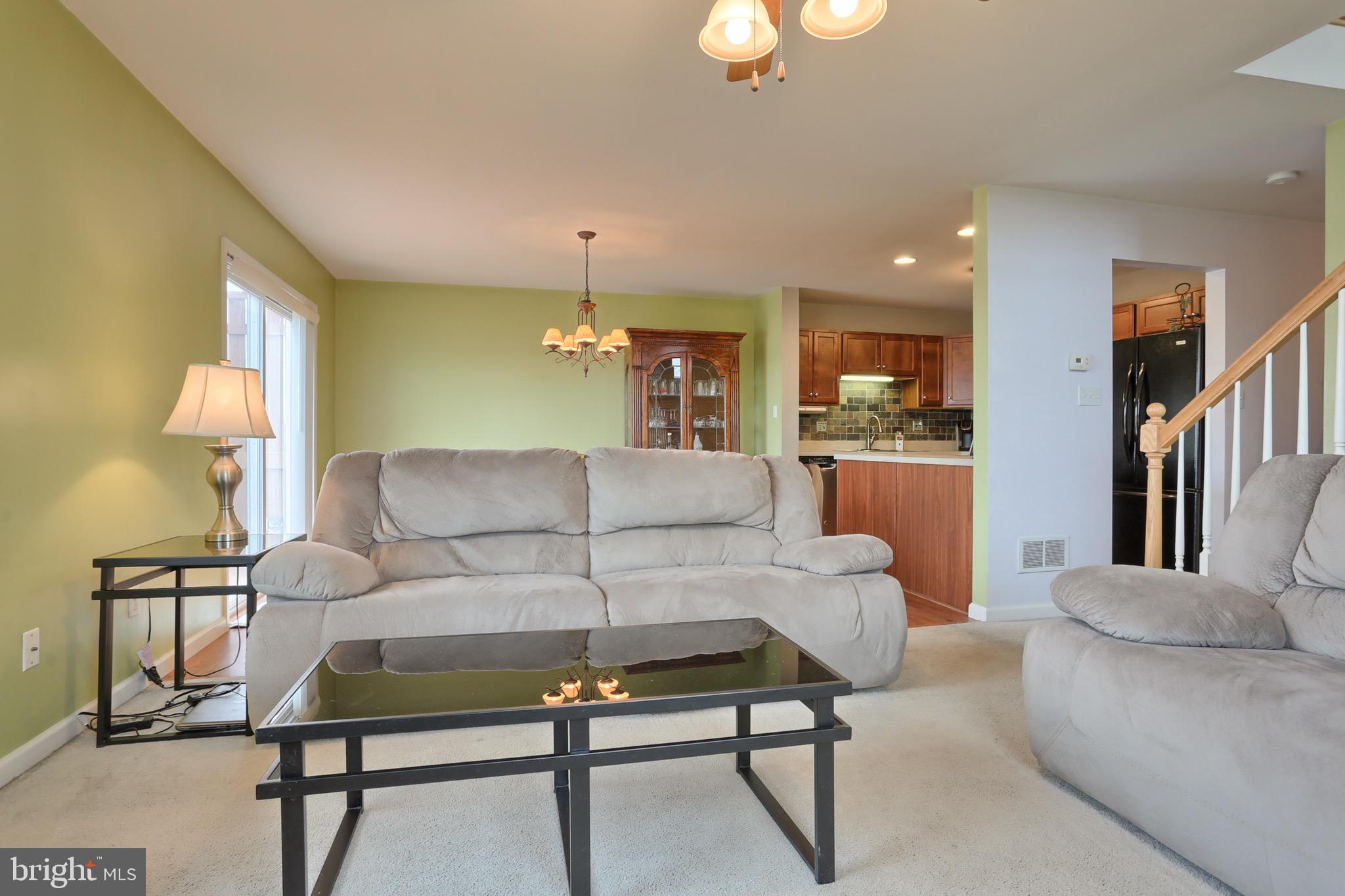 576 Fox Ridge Lane Lebanon, PA 17042 - Photo 12 of 34 Living Room Opens to Dining Area