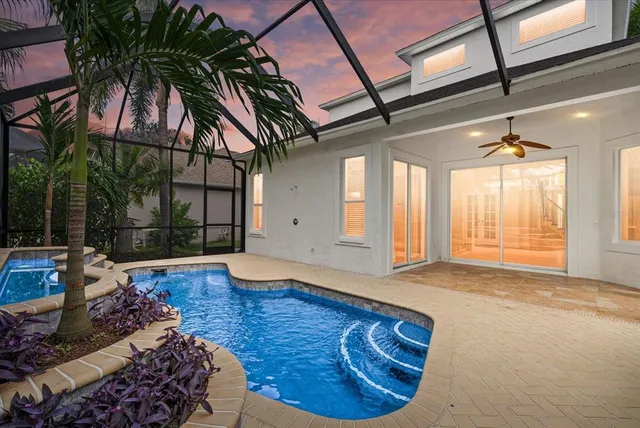a view of livingroom with furniture and floor to ceiling window