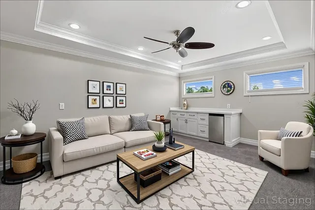 a view of an empty room with window and cabinet