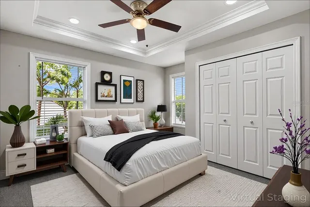 a roof deck with table and chairs a barbeque with wooden fence