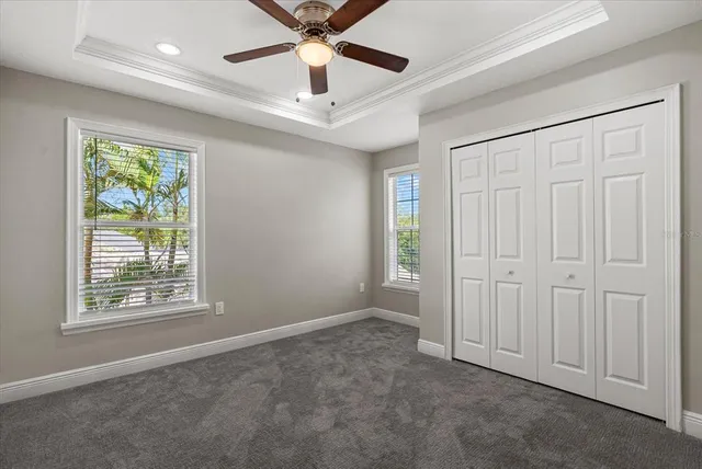 a swimming pool with outdoor seating and outdoor seating