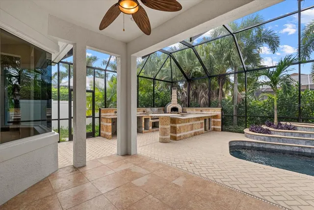 a view of a swimming pool with a patio