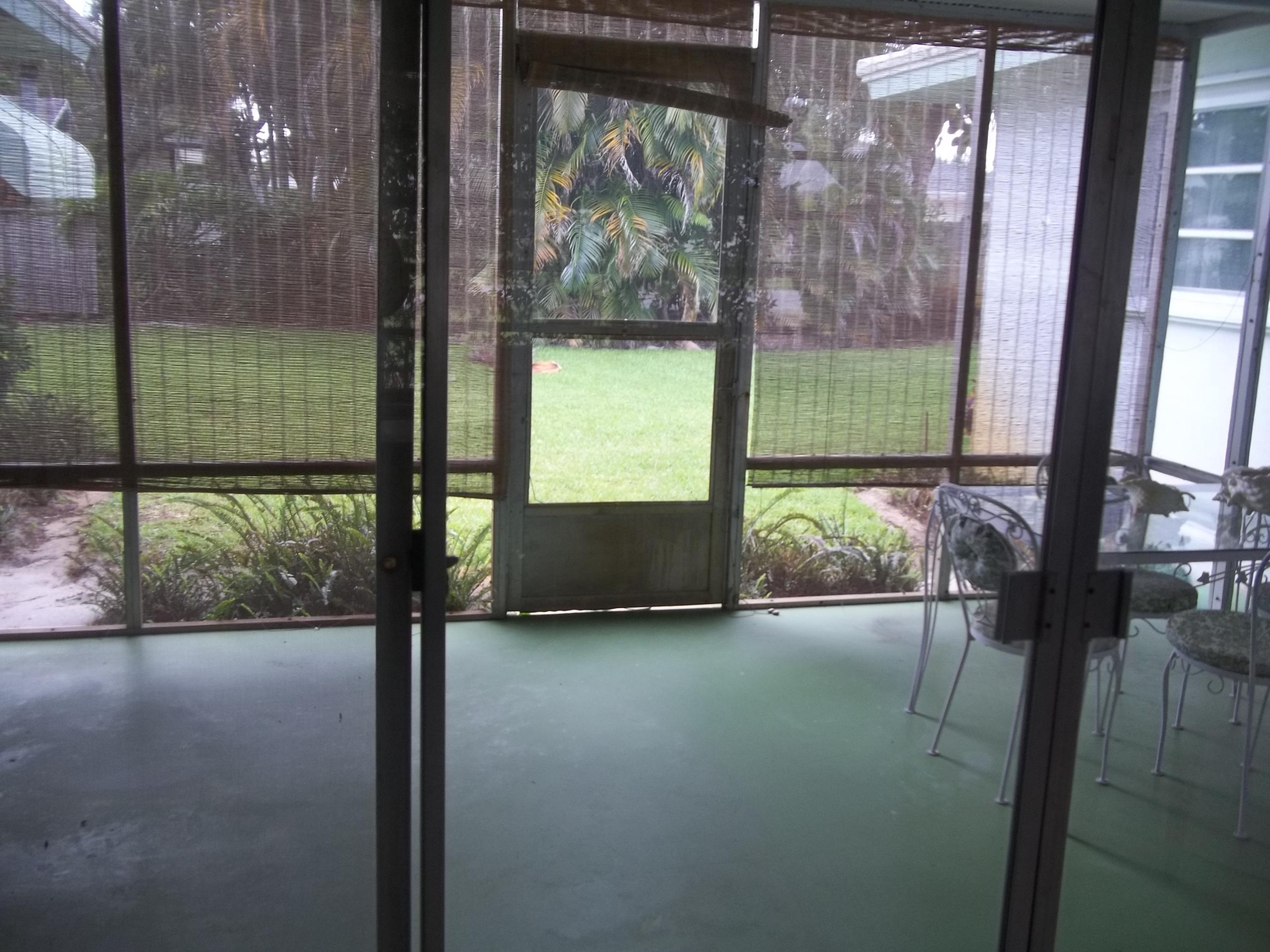 1509 Donald Road Jupiter, FL 33469 - Photo 16 of 19 Screened Patio