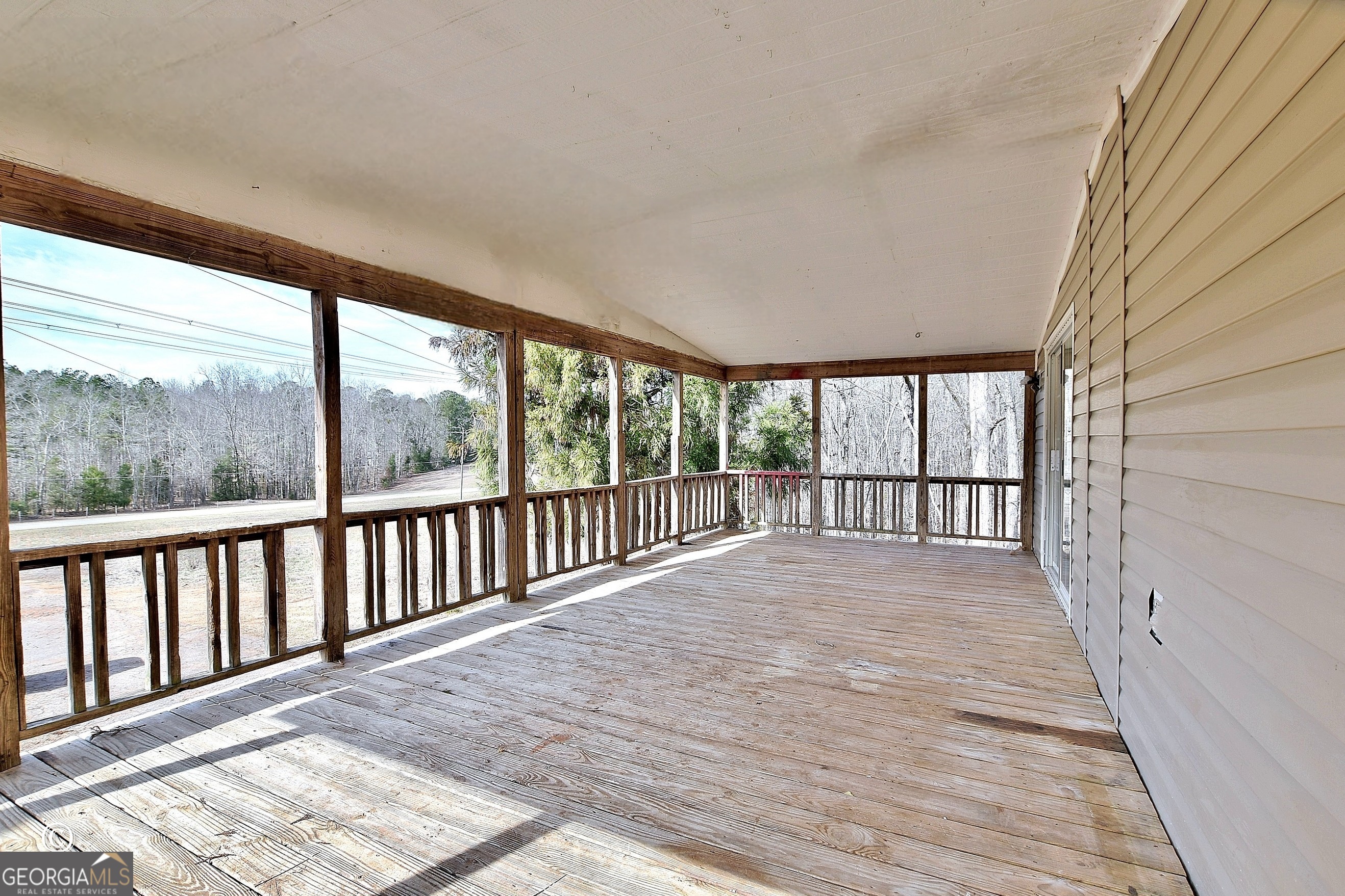 760 Hamilton Mulberry Grove Road Cataula, GA 31804 - Photo 23 of 26 a view of a balcony with wooden floor
