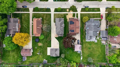 an aerial view of house with yard