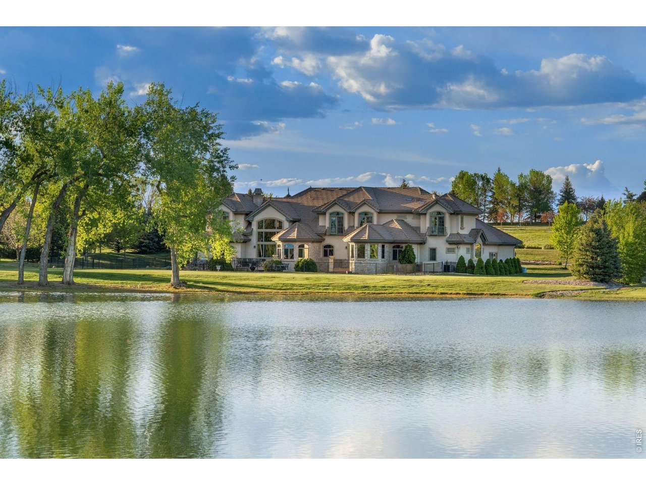 9715 Meadow Ridge Lane Longmont, CO 80504 - Photo 11 of 17 a view of swimming pool with outdoor seating and yard in back