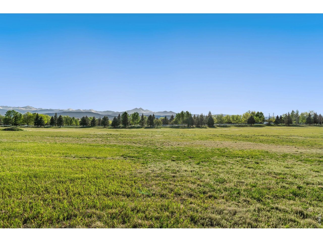 9715 Meadow Ridge Lane Longmont, CO 80504 - Photo 17 of 17 a view of a field with an ocean