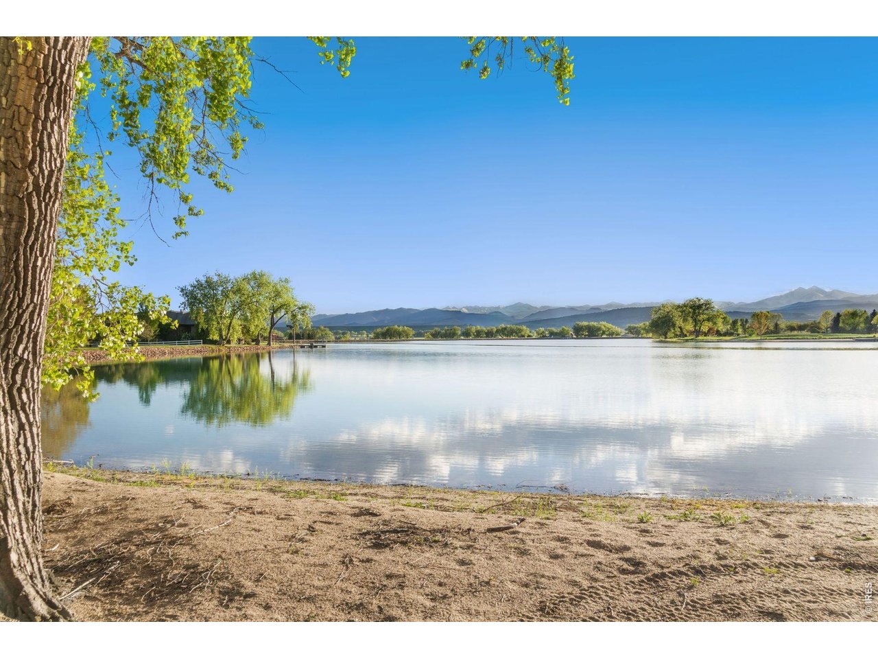 9715 Meadow Ridge Lane Longmont, CO 80504 - Photo 6 of 17 a view of lake with green space