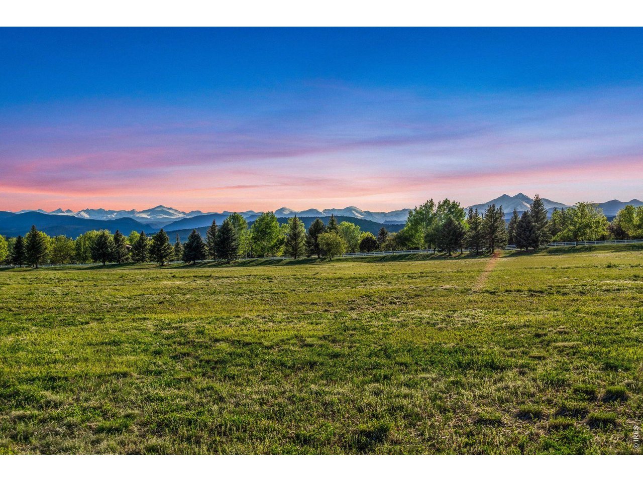 9715 Meadow Ridge Lane Longmont, CO 80504 - Photo 9 of 17 a view of a field with an ocean
