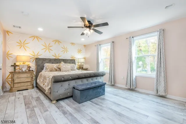 a view of a house with swimming pool and a yard