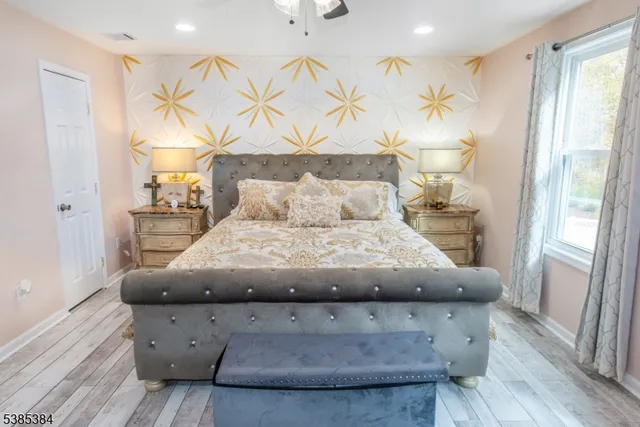 an aerial view of a house with swimming pool