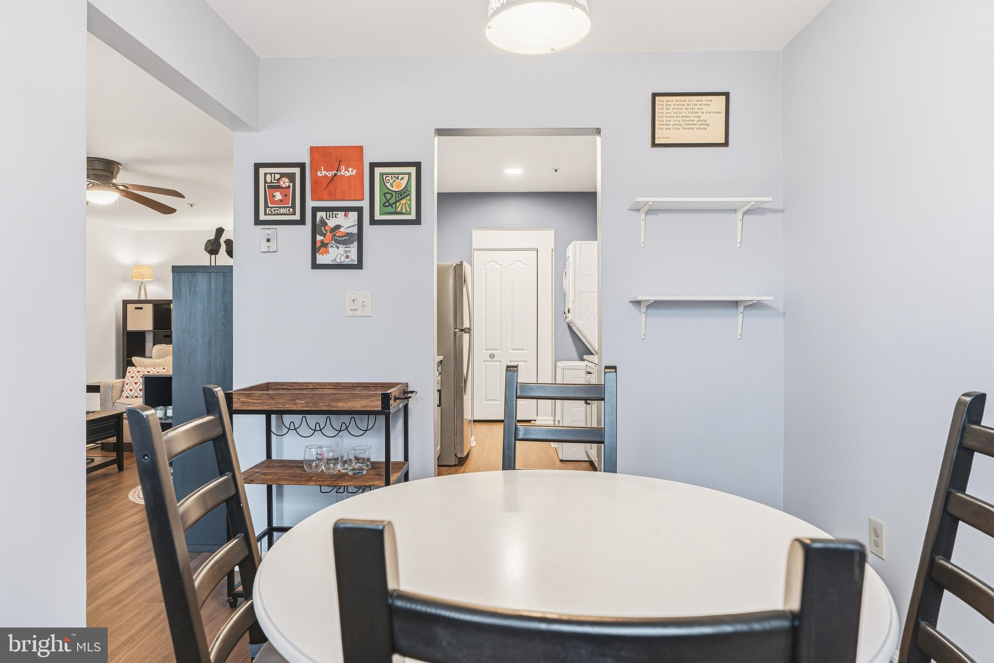 8495 Falls Run Road, Unit B Ellicott City, MD 21043 - Photo 18 of 34 a view of a dining room with furniture