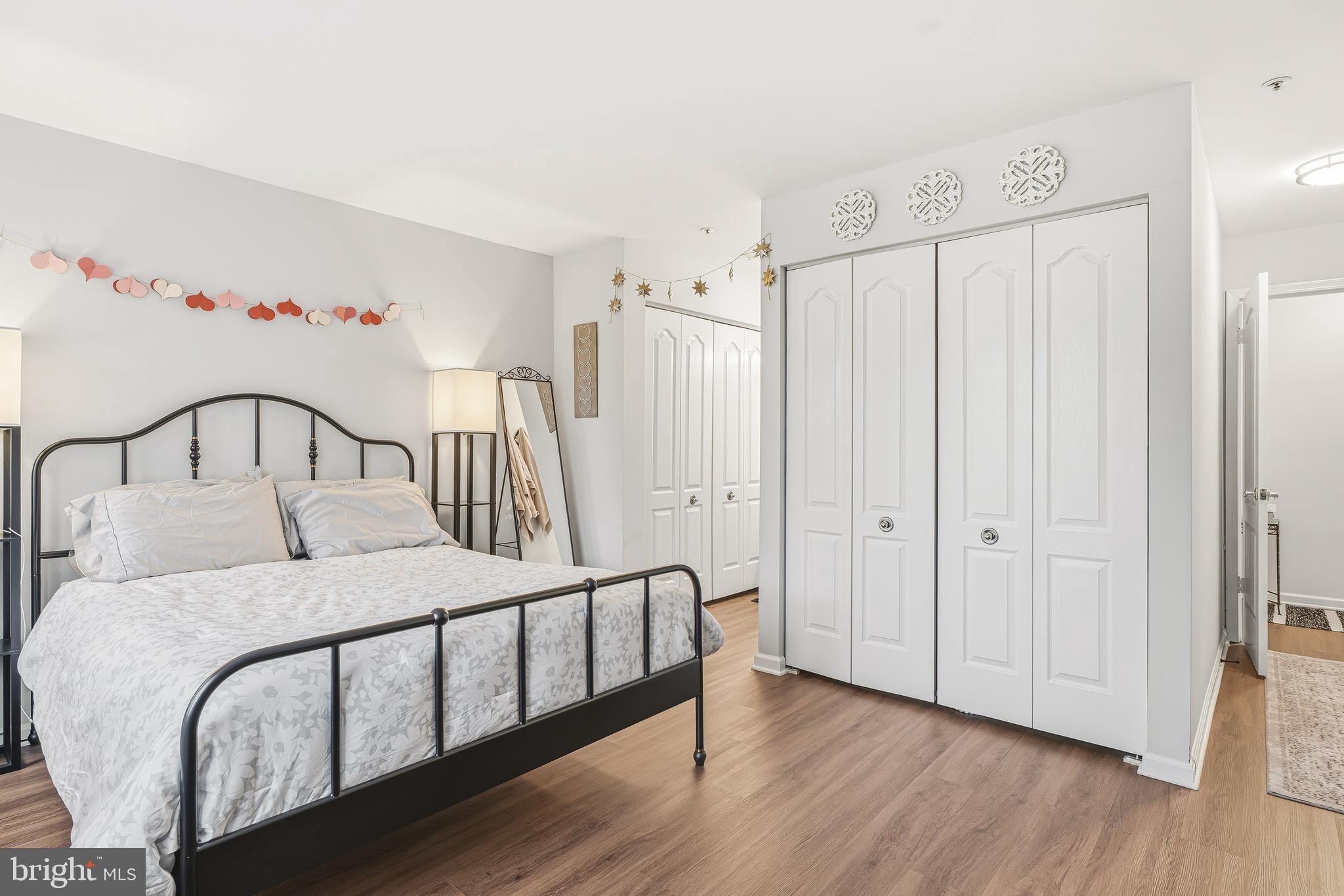 8495 Falls Run Road, Unit B Ellicott City, MD 21043 - Photo 20 of 34 a bedroom with a bed and a window