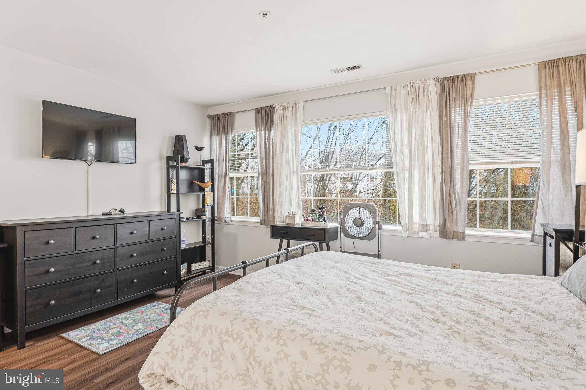 8495 Falls Run Road, Unit B Ellicott City, MD 21043 - Photo 21 of 34 a bedroom with a bed and a large window