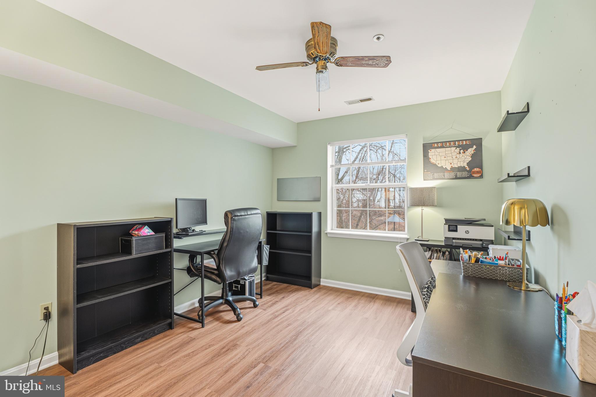 8495 Falls Run Road, Unit B Ellicott City, MD 21043 - Photo 25 of 34 a view of a workspace with furniture and a window