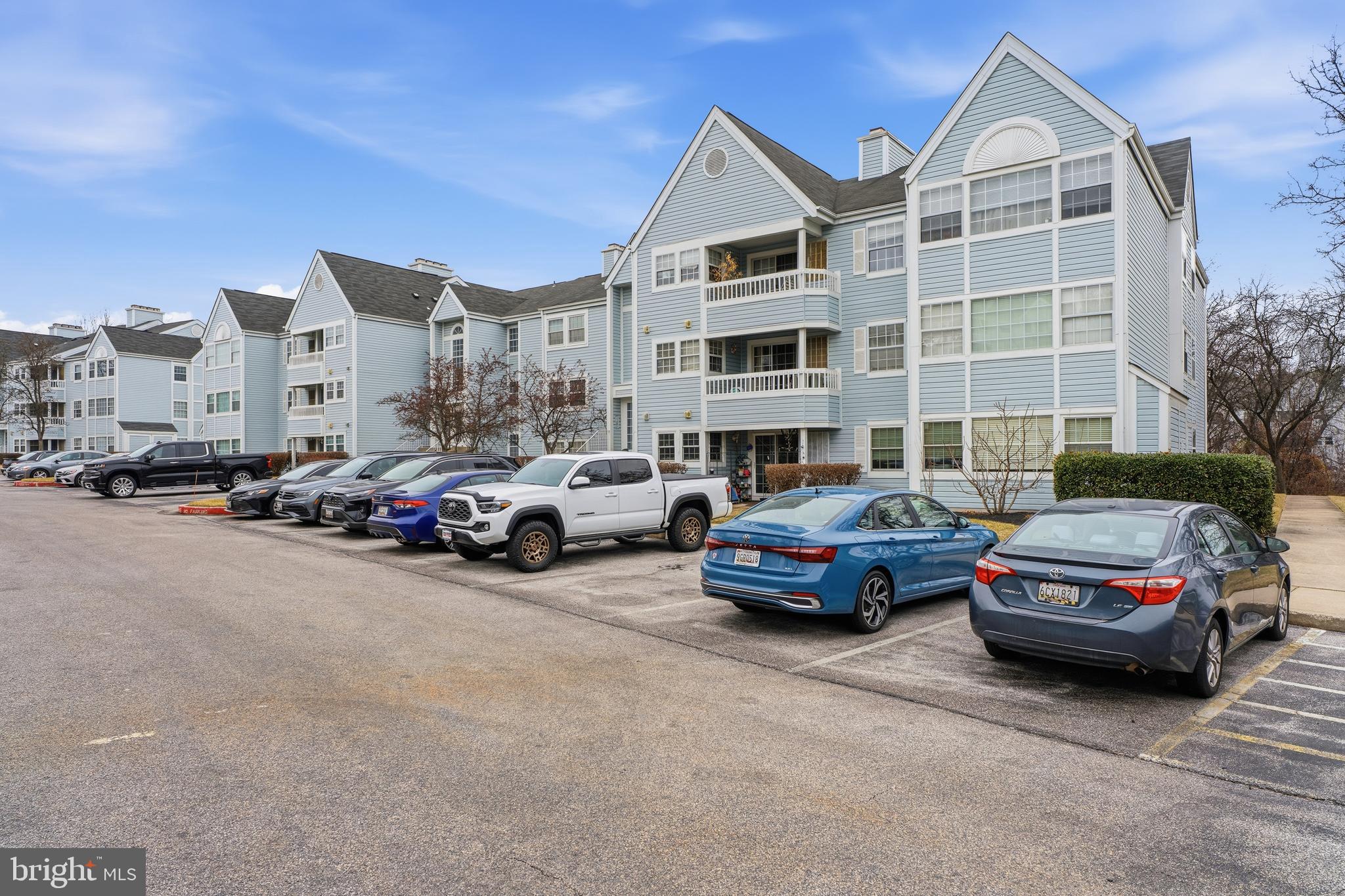 8495 Falls Run Road, Unit B Ellicott City, MD 21043 - Photo 3 of 34 a car parked in front of a house