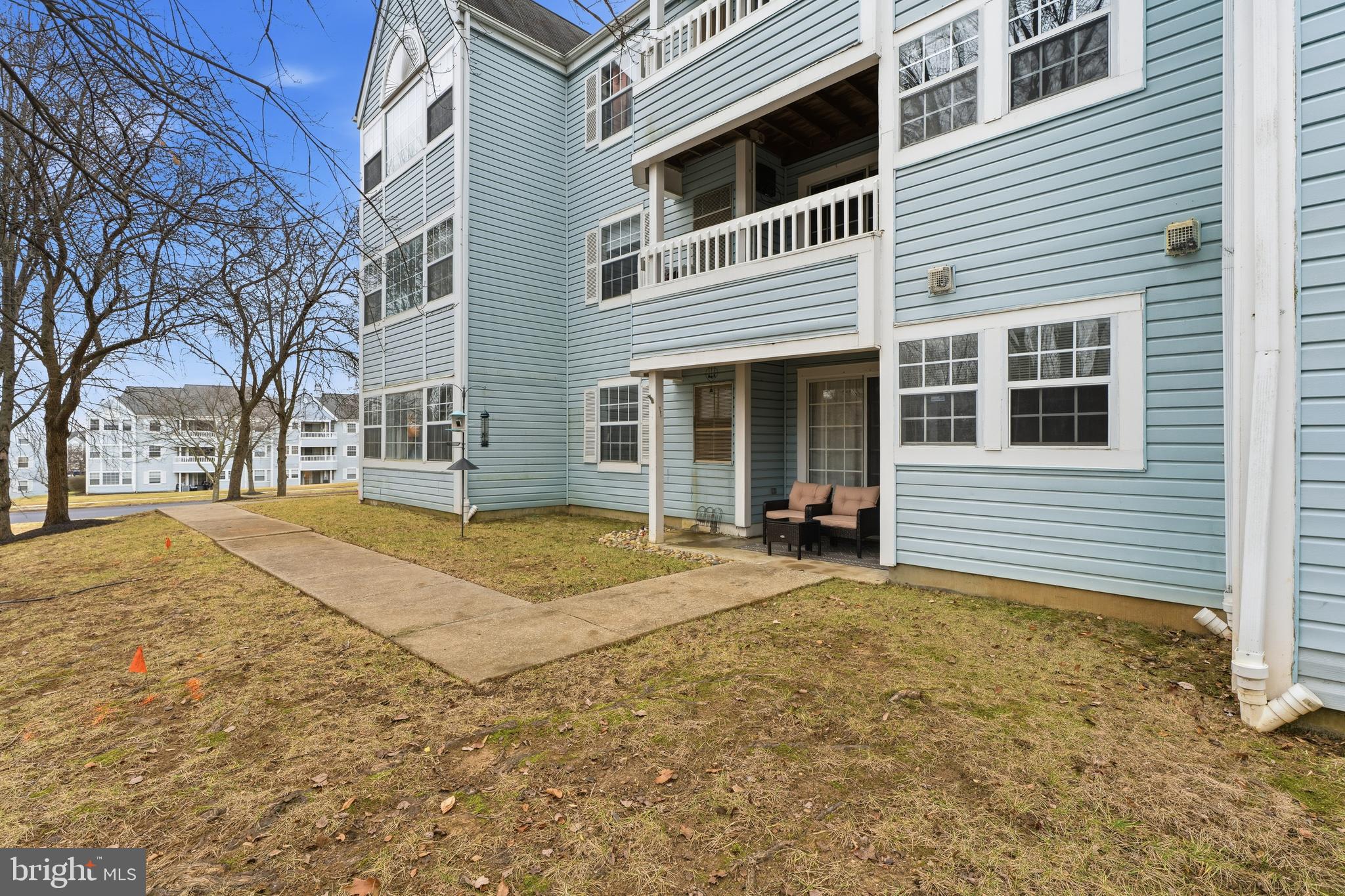 8495 Falls Run Road, Unit B Ellicott City, MD 21043 - Photo 31 of 34 a view of the house with snow on the road
