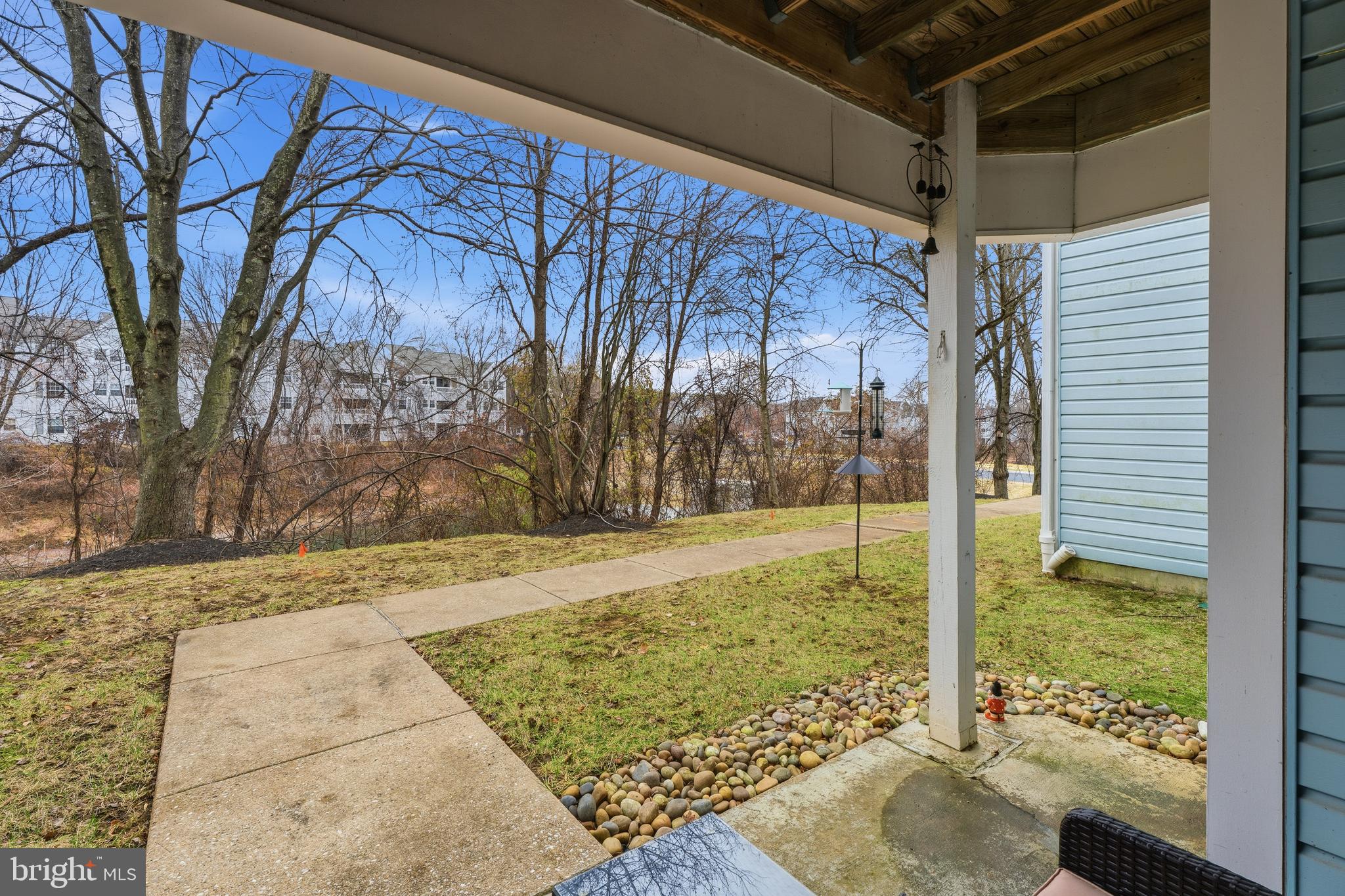 8495 Falls Run Road, Unit B Ellicott City, MD 21043 - Photo 33 of 34 a view of a backyard of the house