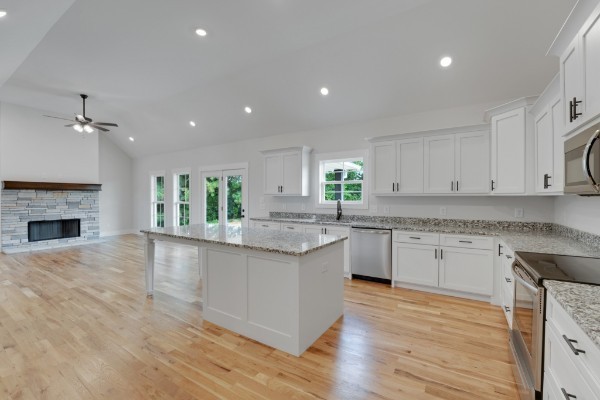 1100 Goose Drive Springfield, TN 37172 - Photo 5 of 19 a large kitchen with granite countertop a stove top oven a sink a counter space and wooden floor