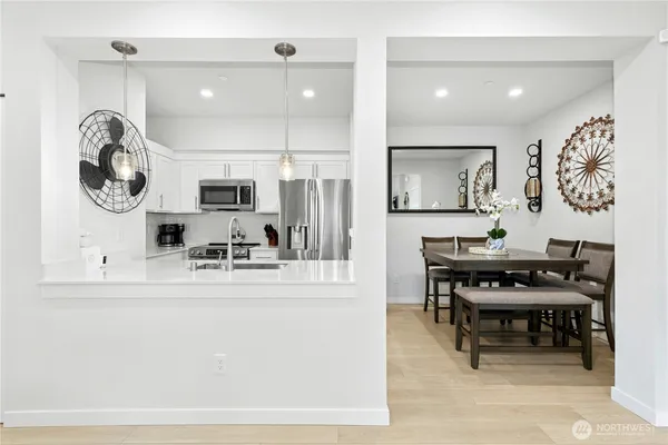 a view of a dining room with furniture