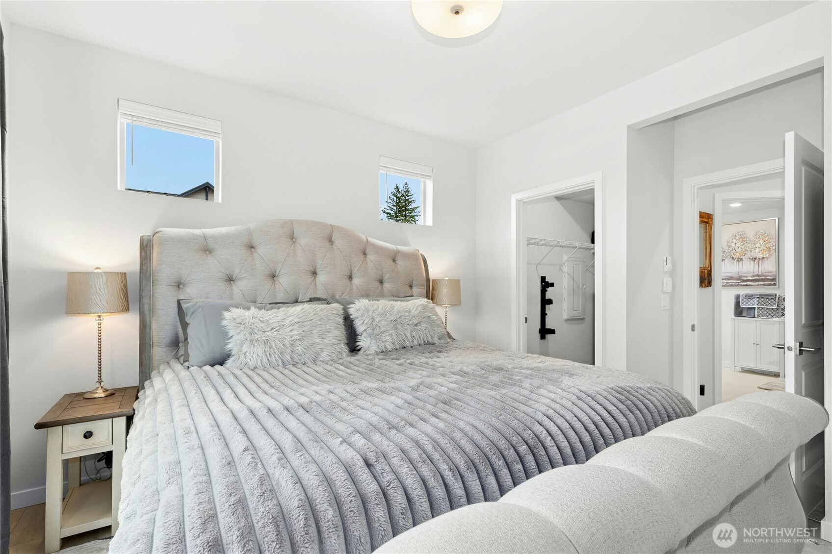 1845 Southeast 12th Place, Unit H204 North Bend, WA 98045 - Photo 12 of 31 a bedroom with a bed and a couch