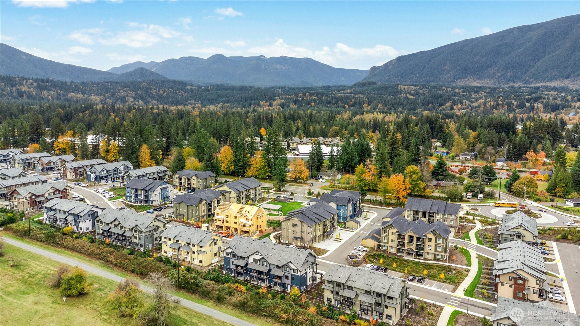 1845 Southeast 12th Place, Unit H204 North Bend, WA 98045 - Photo 23 of 31 a view of a lake with a mountain